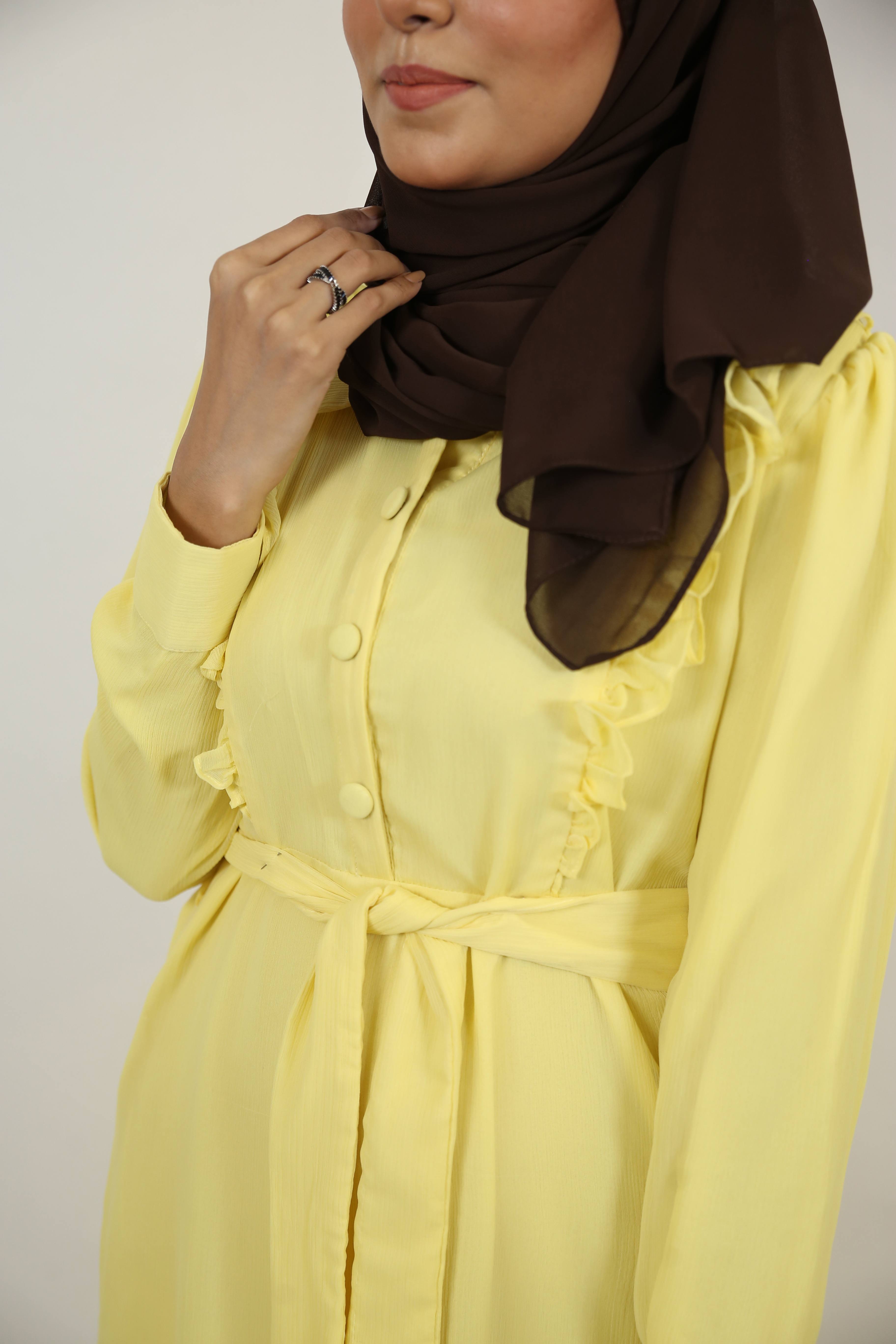 Safraa- Radiant chiffon lined Maxi dress with front flutters and belt with long sleeves- Lemon Yellow