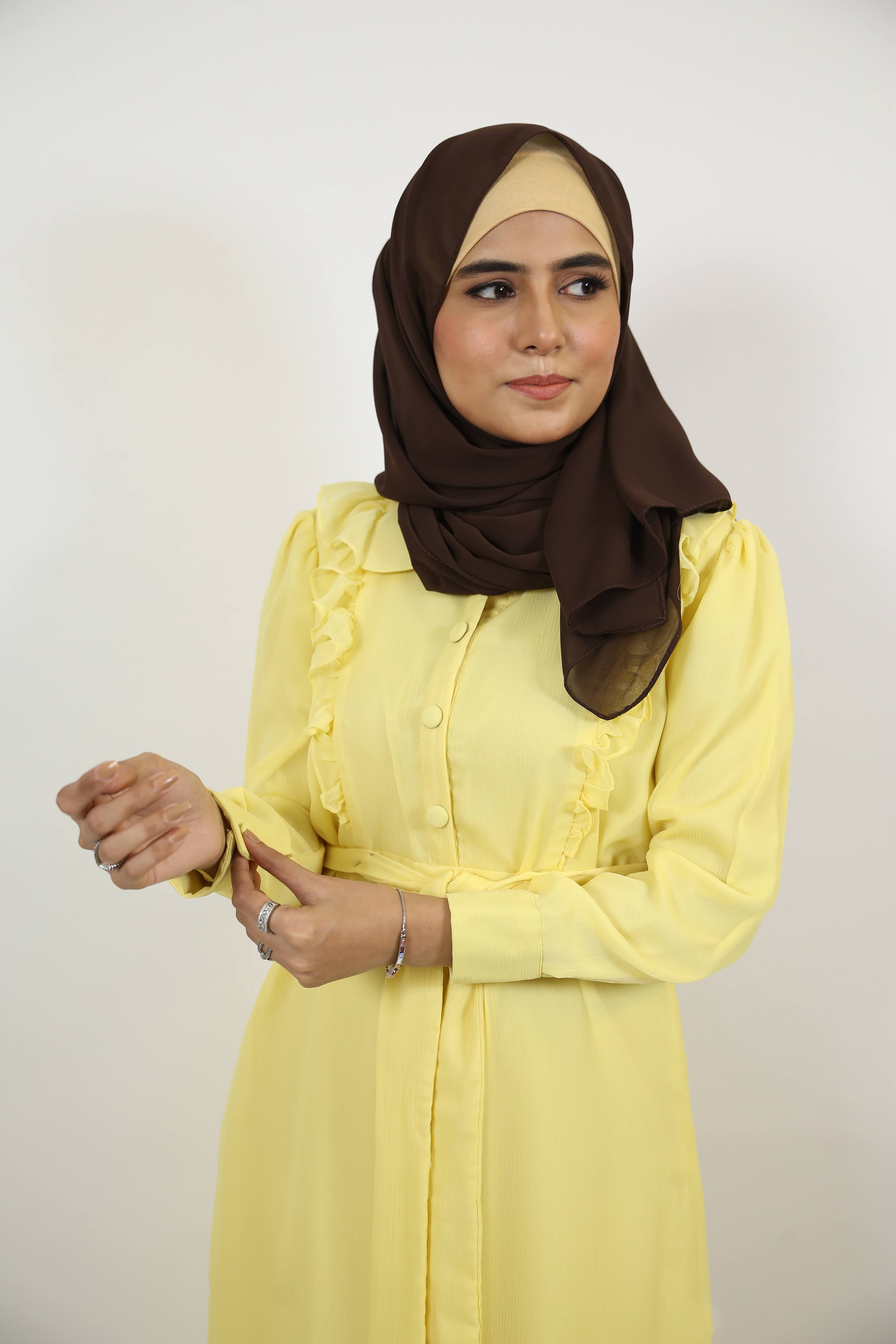 Safraa- Radiant chiffon lined Maxi dress with front flutters and belt with long sleeves- Lemon Yellow