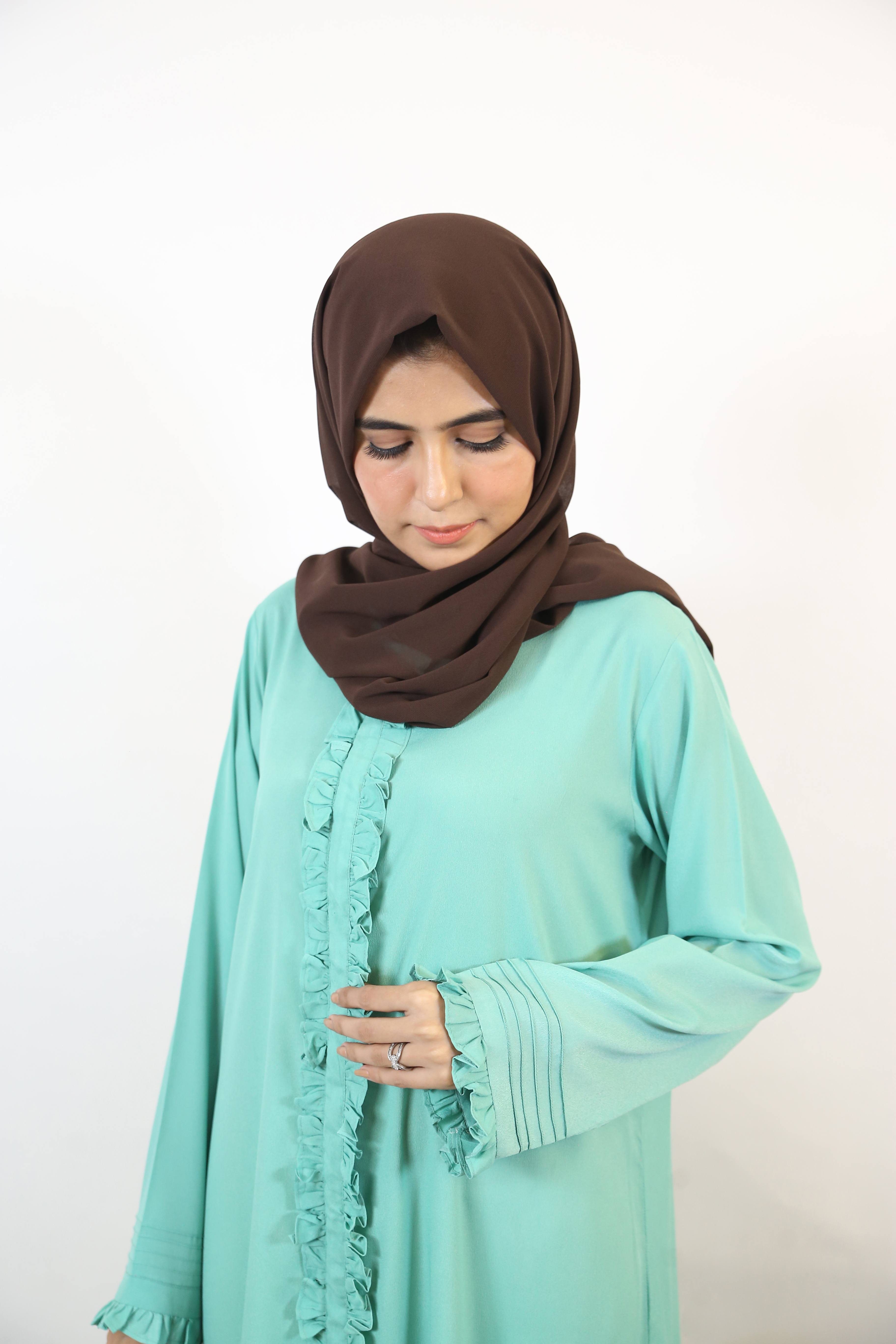 Naseem- Ethereal Maxi abaya with pleated sleeves and full length Ruffled-Mint Green