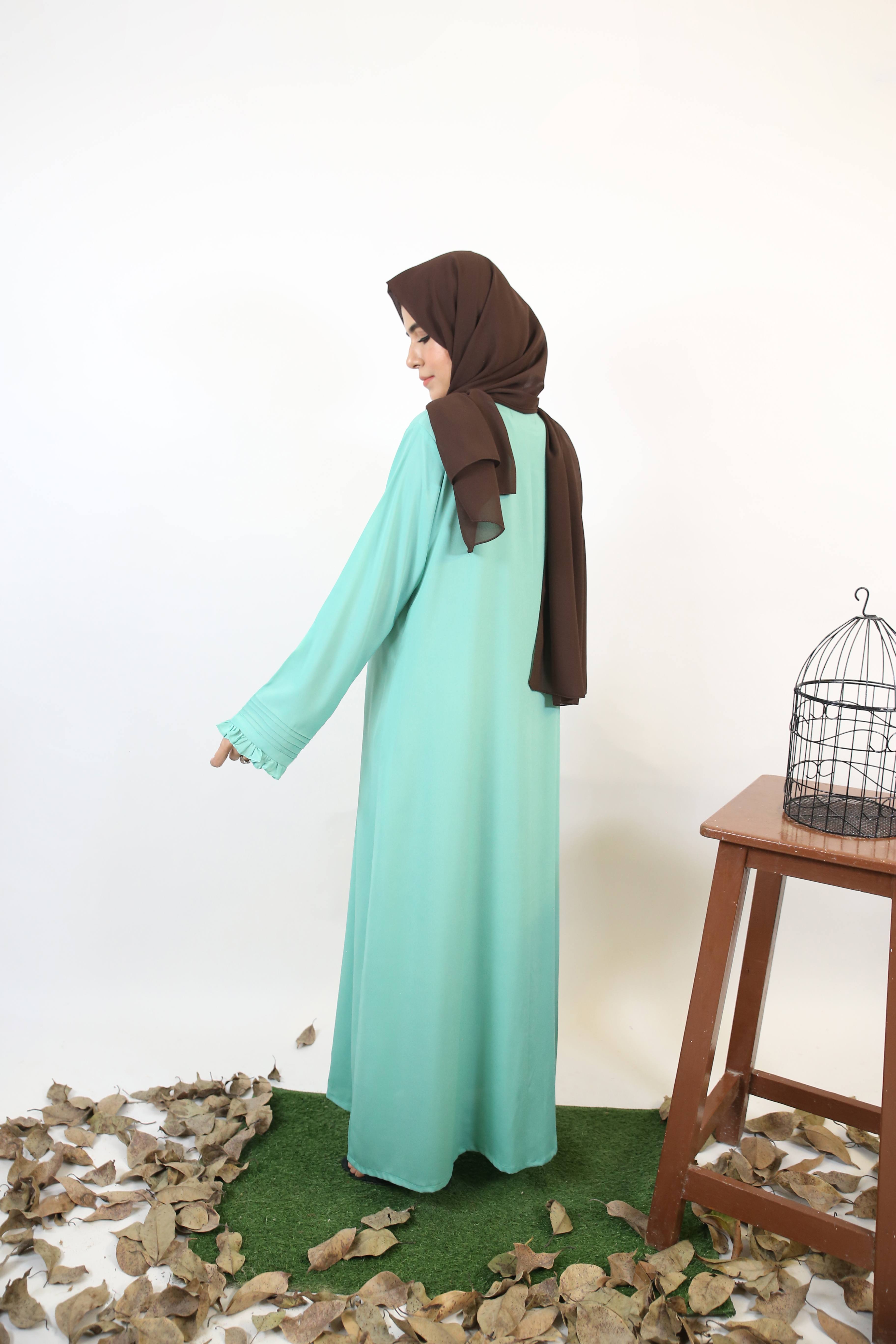 Naseem- Ethereal Maxi abaya with pleated sleeves and full length Ruffled-Mint Green