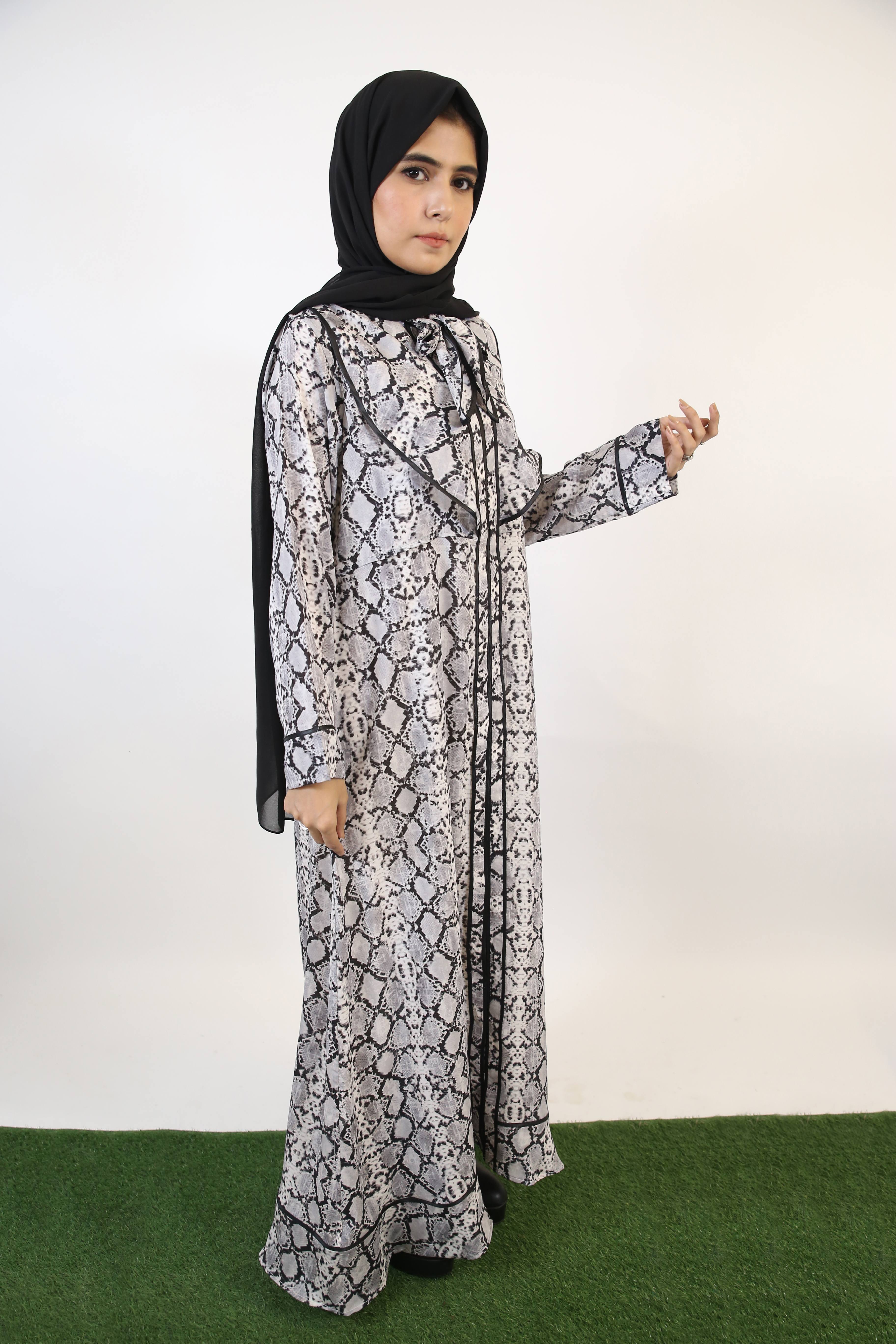 Maren- Exotic Serpent skin print Maxi Dress with bow neck and piping detail