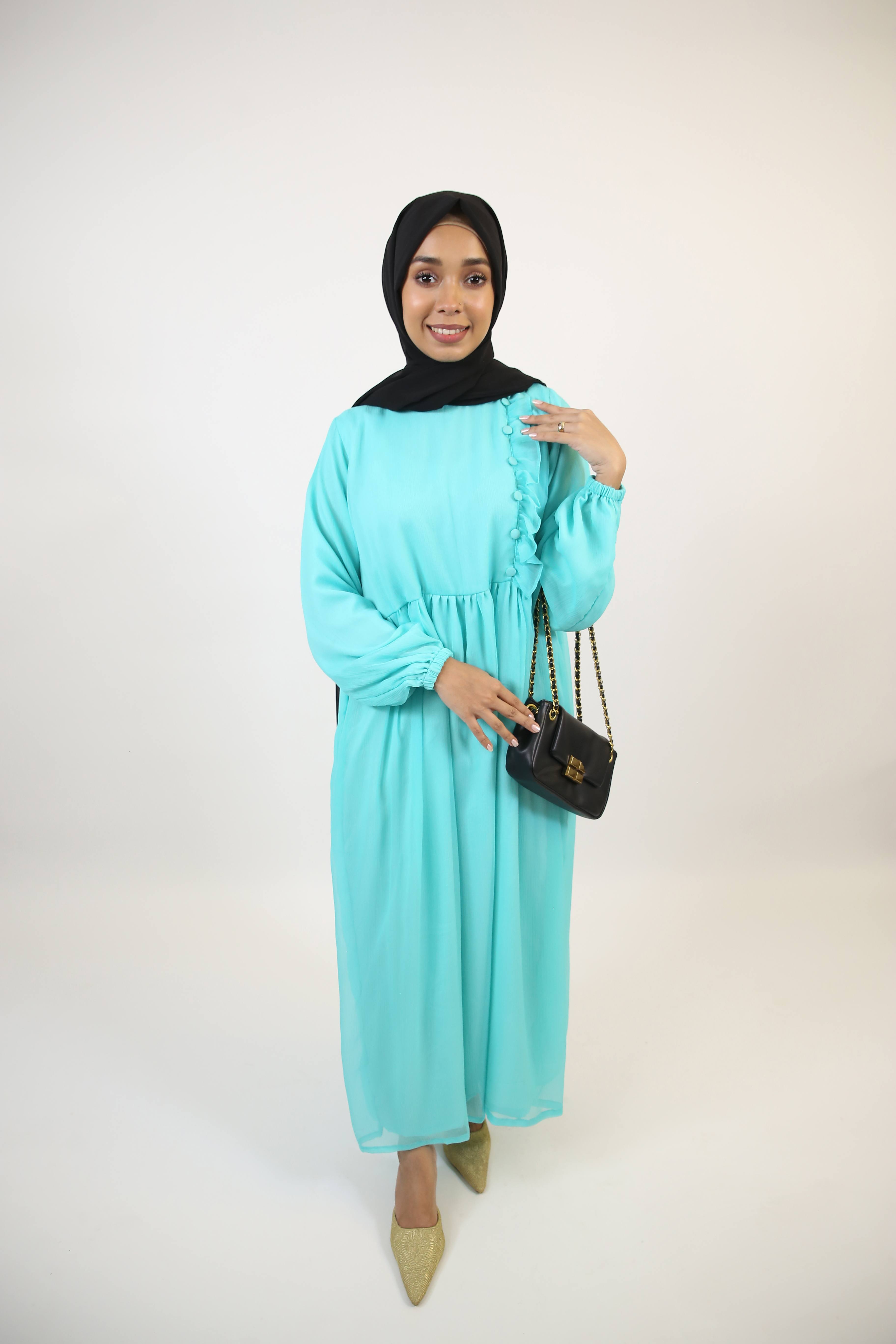 Feerozi- Alluring Chiffon fully lined maxi dress with ruffled front detailings- Turquoise blue