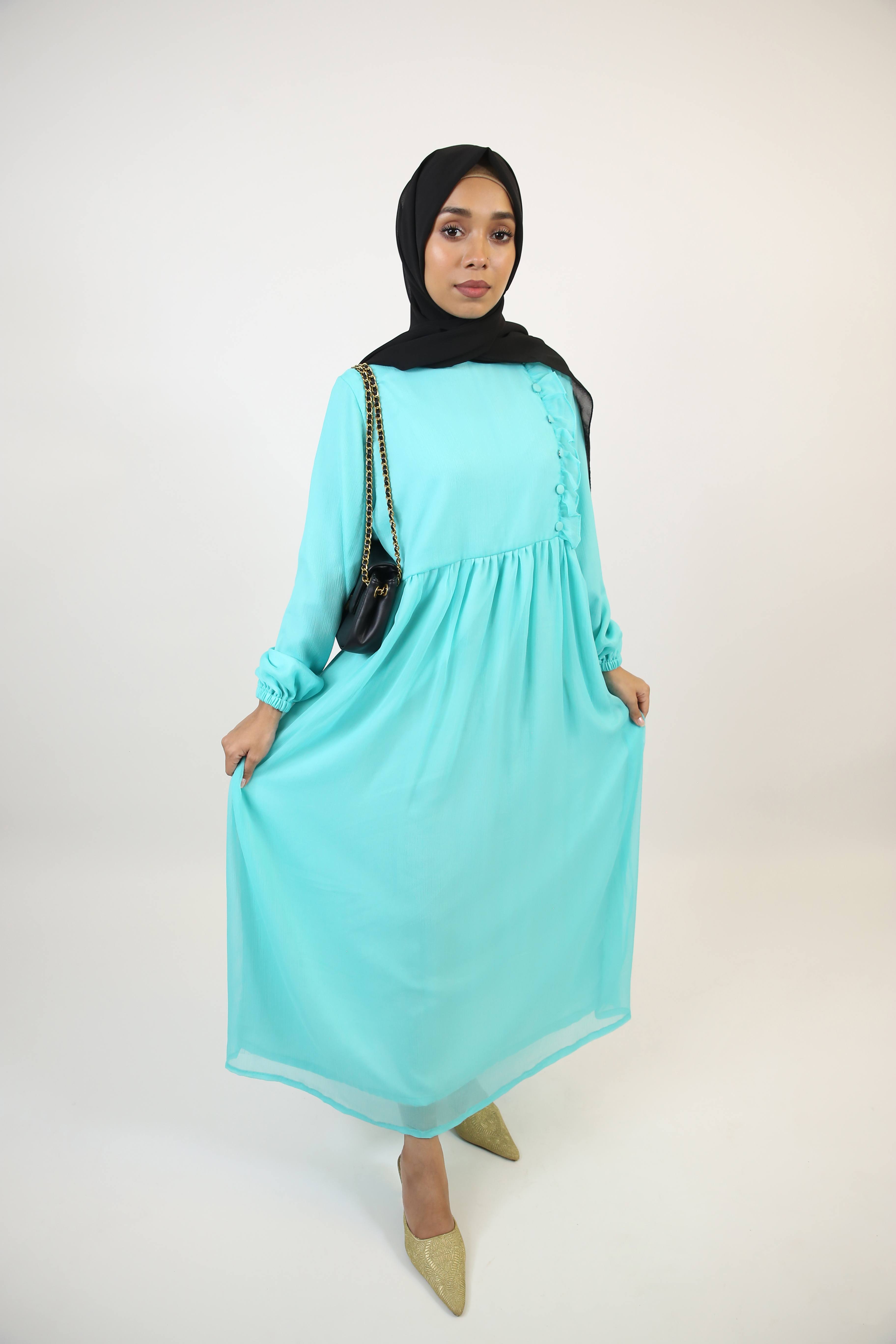 Feerozi- Alluring Chiffon fully lined maxi dress with ruffled front detailings- Turquoise blue