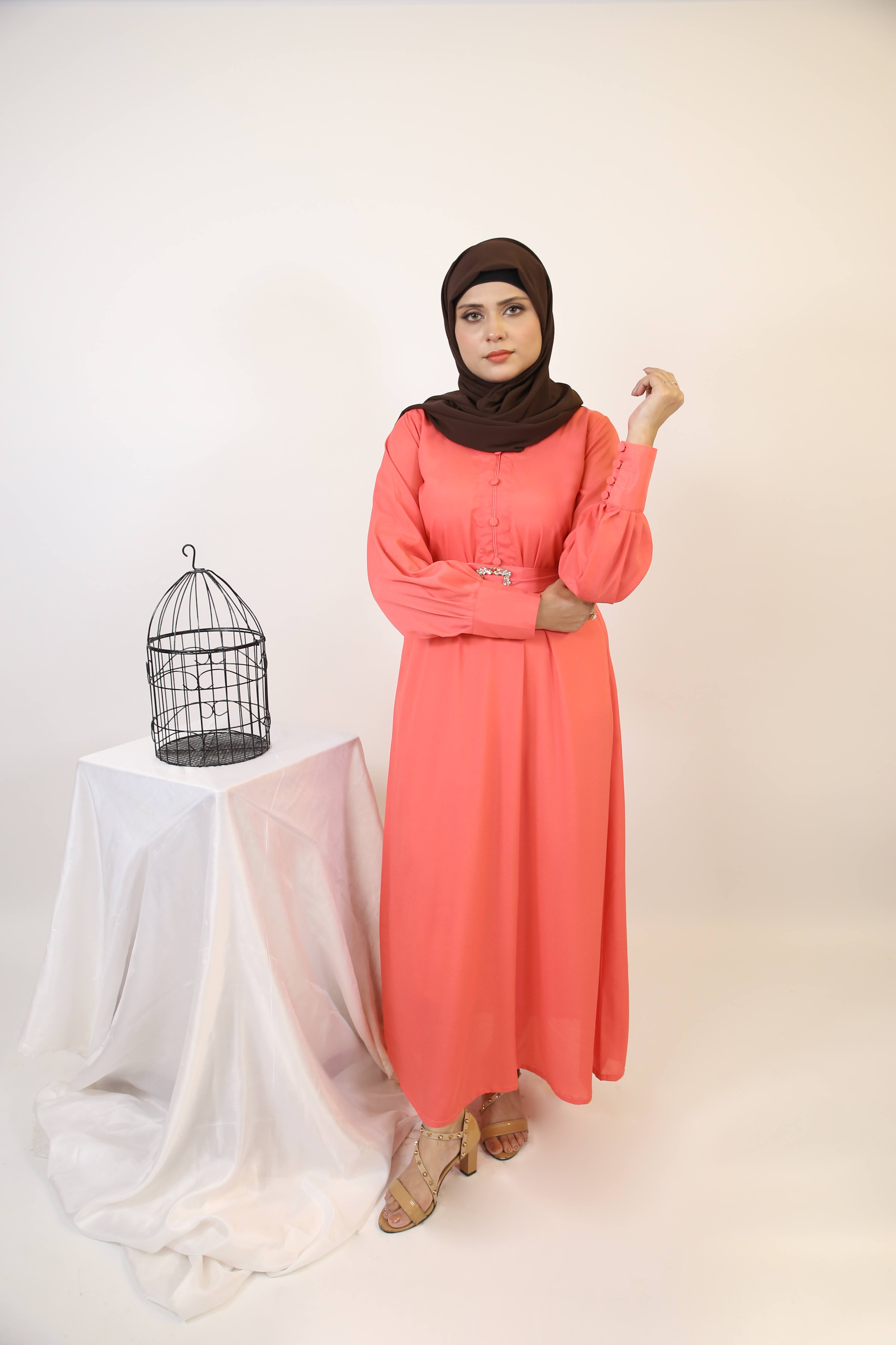 Baqah- Enchanting maxi dress with belt embellishment and cuffed sleeves- Apricot pink