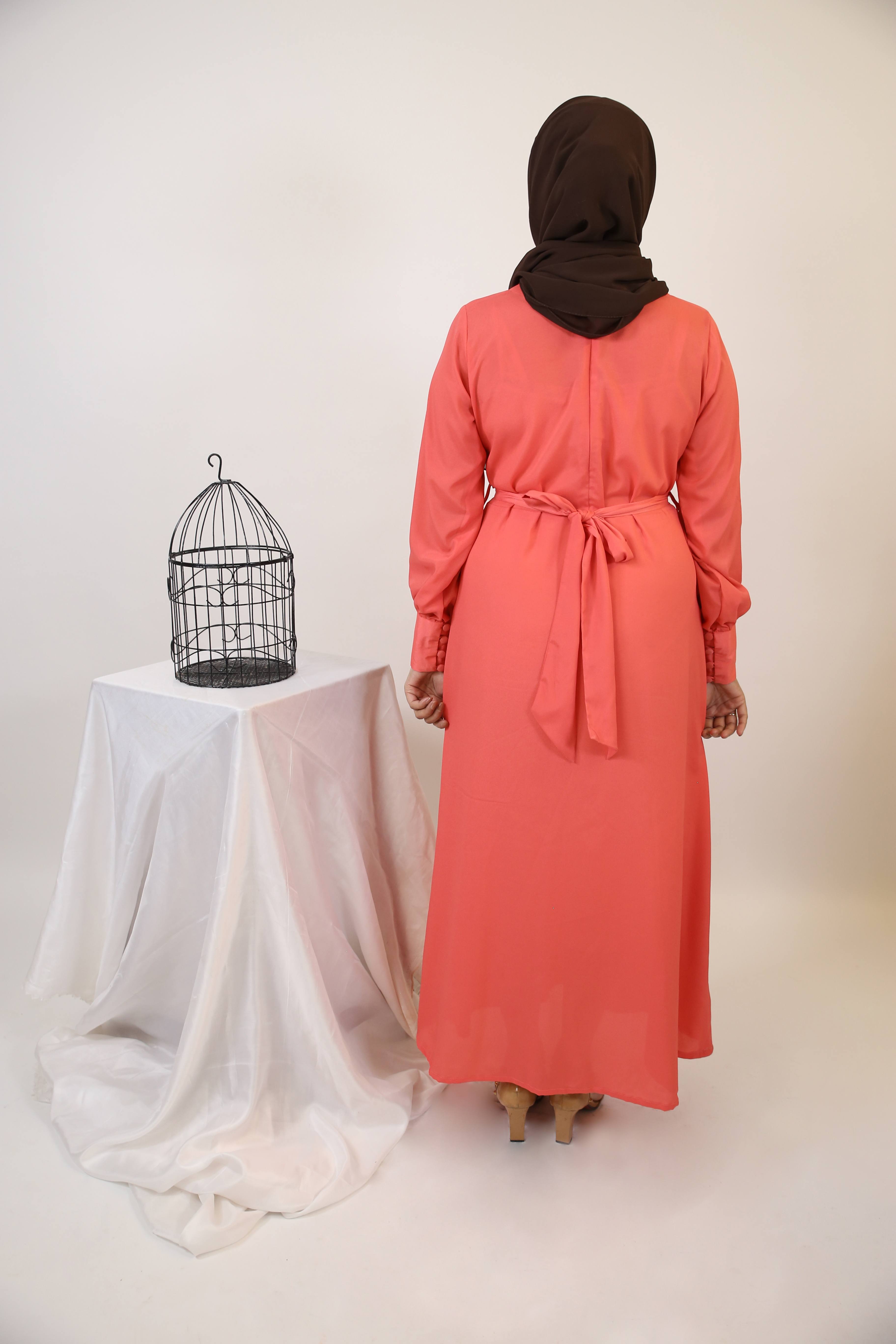Baqah- Enchanting maxi dress with belt embellishment and cuffed sleeves- Apricot pink