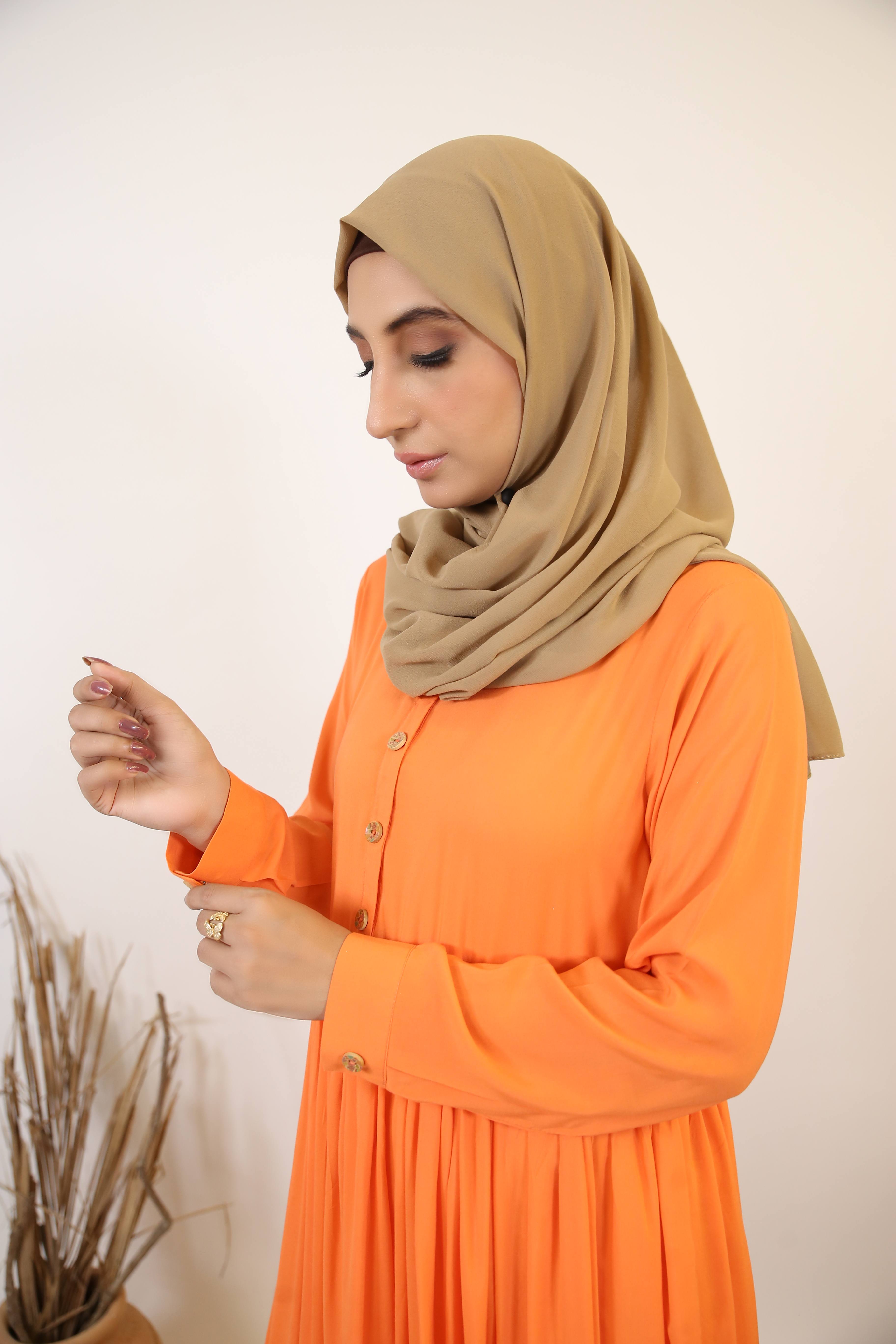 Lahab- Striking Linen maxi dress with ruffled hem and button on front- Tangerine orange