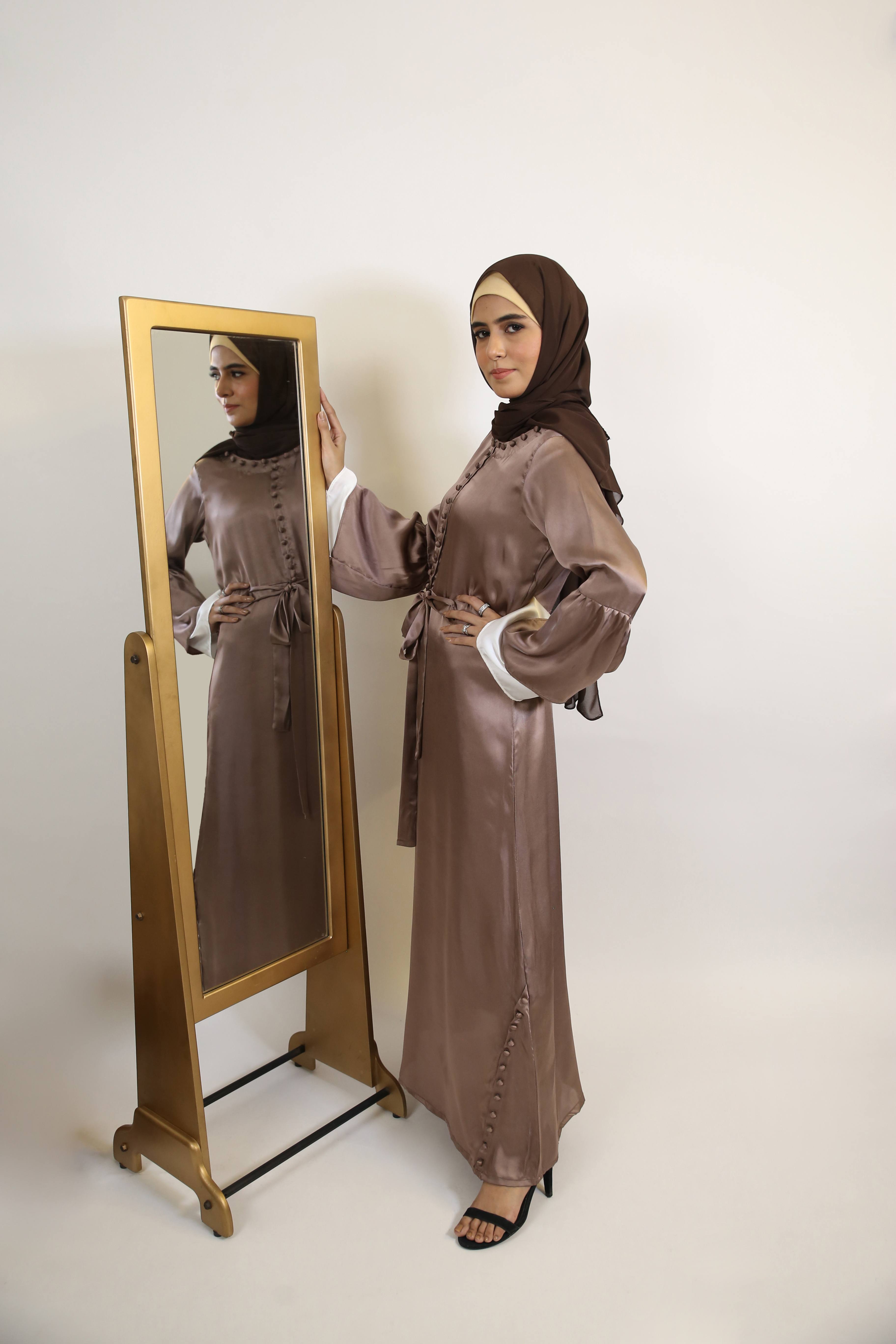 Abeer-Ethereal Satin Maxi Dress with buttoned detailing on neck and hem with bell sleeves- Beige brown