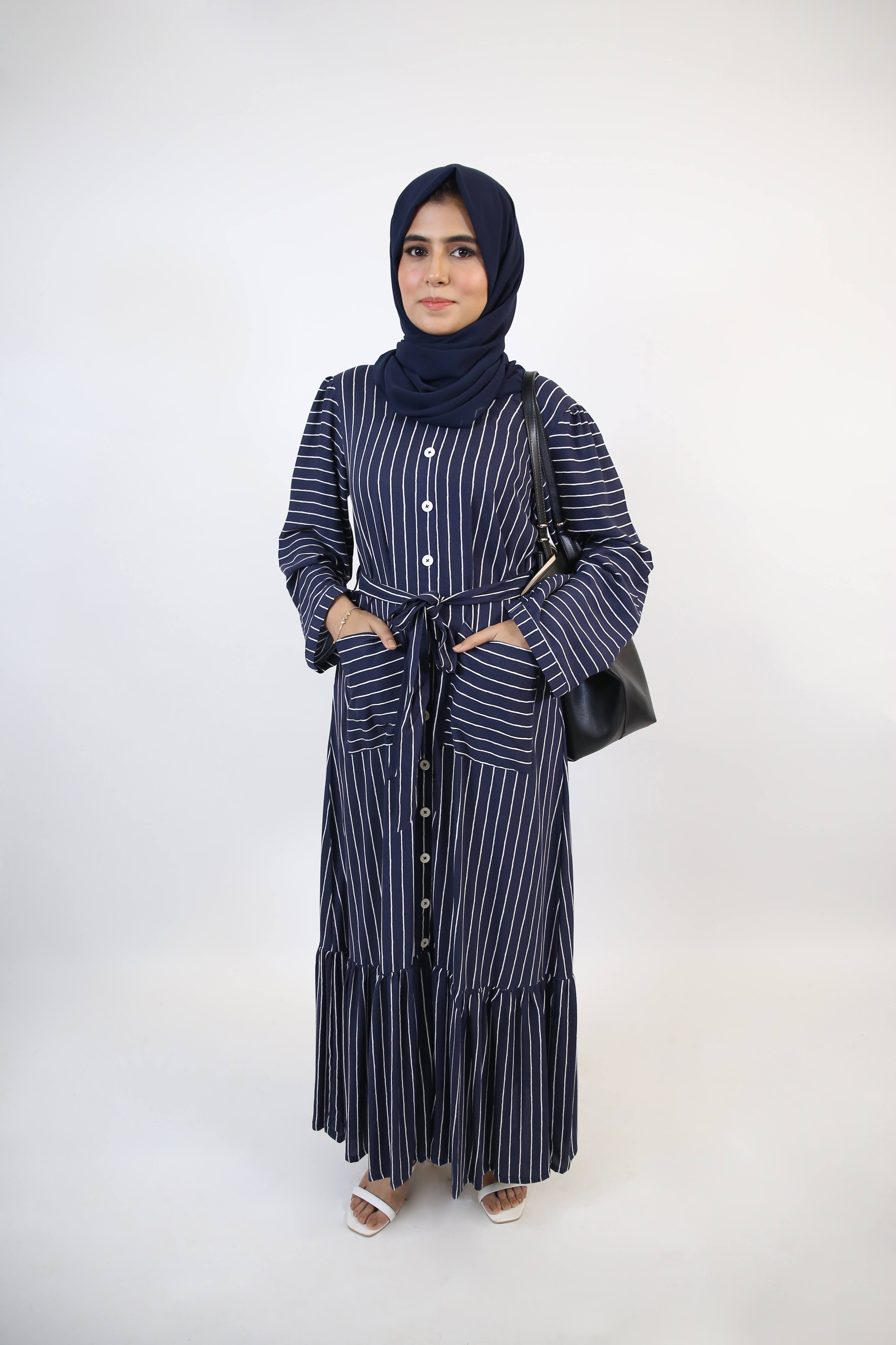 Mahit- Chic Linen Maxi Dress with side pockets and ruffled hem in navy blue pinstripe