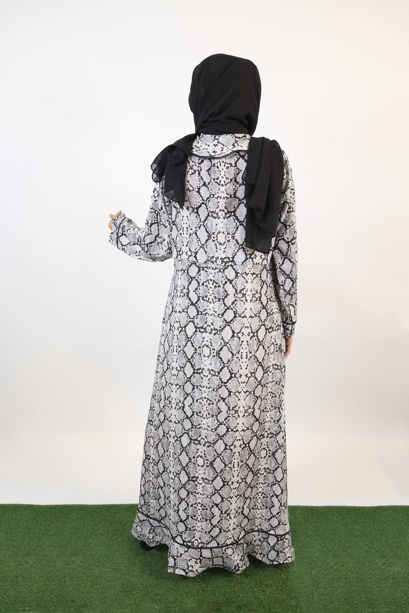 Maren- Exotic Serpent skin print Maxi Dress with bow neck and piping detail
