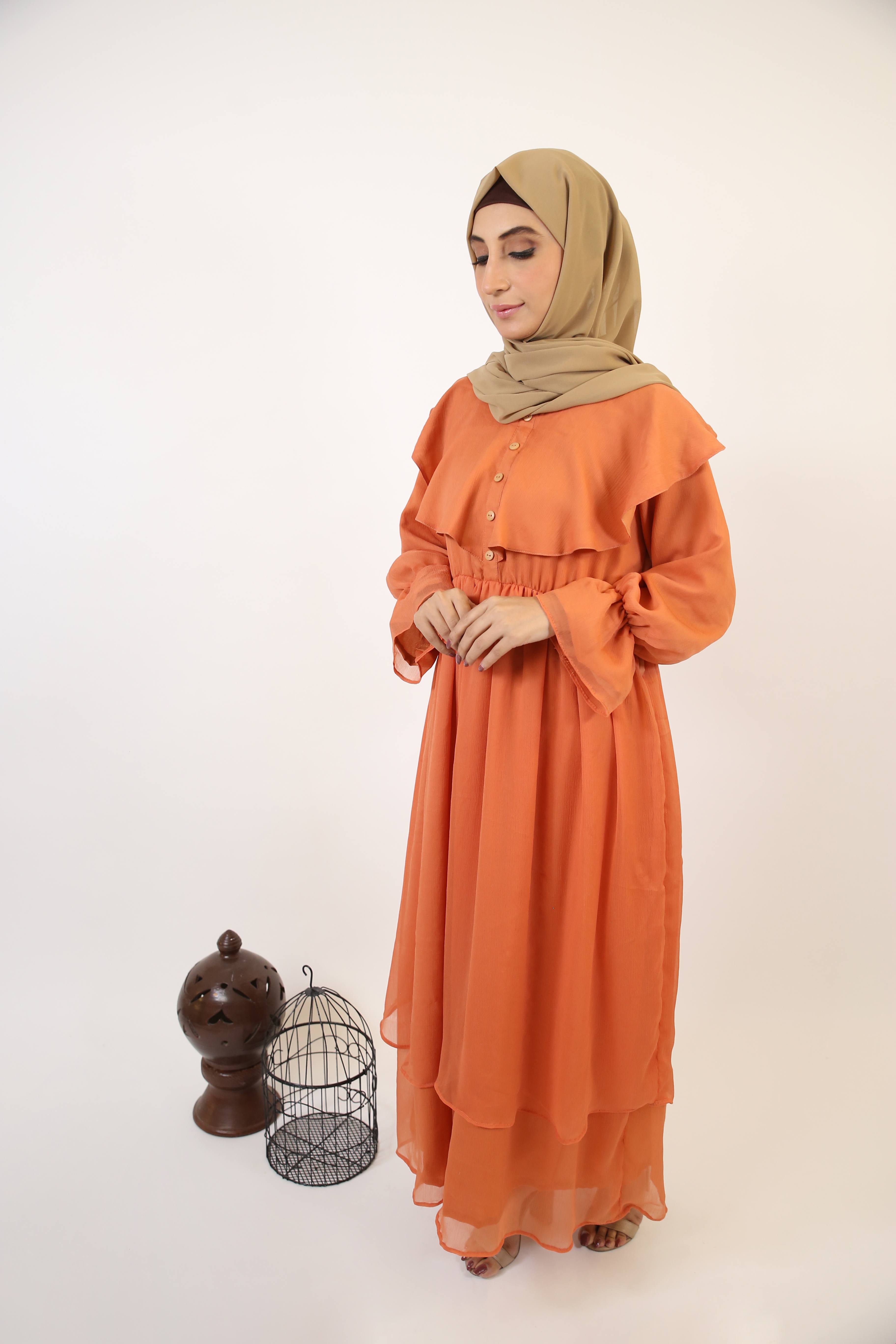 Nahas- Exquisite chiffon fully lined maxi dress with collar detailing and layered hem- Copper Orange