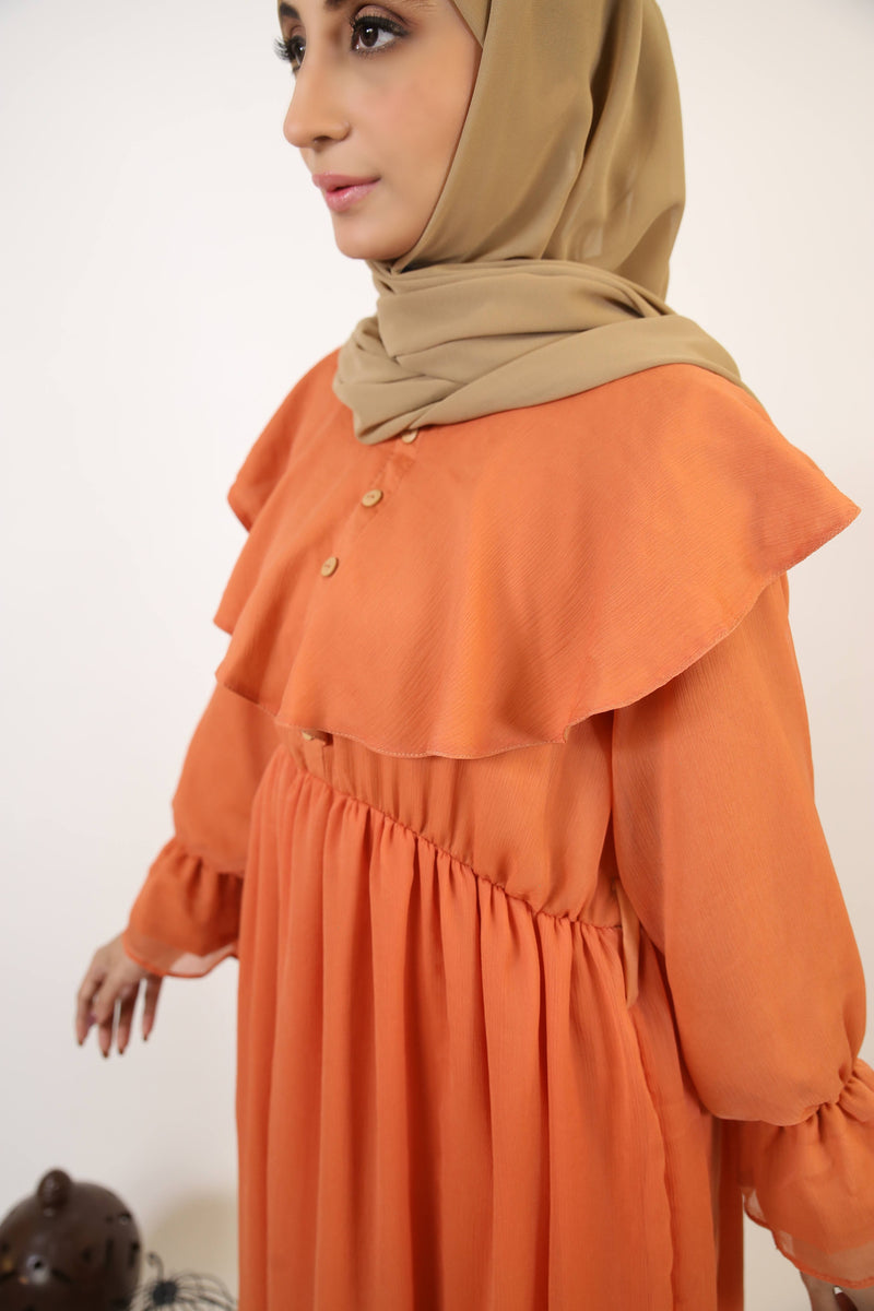 Nahas- Exquisite chiffon fully lined maxi dress with collar detailing and layered hem- Copper Orange