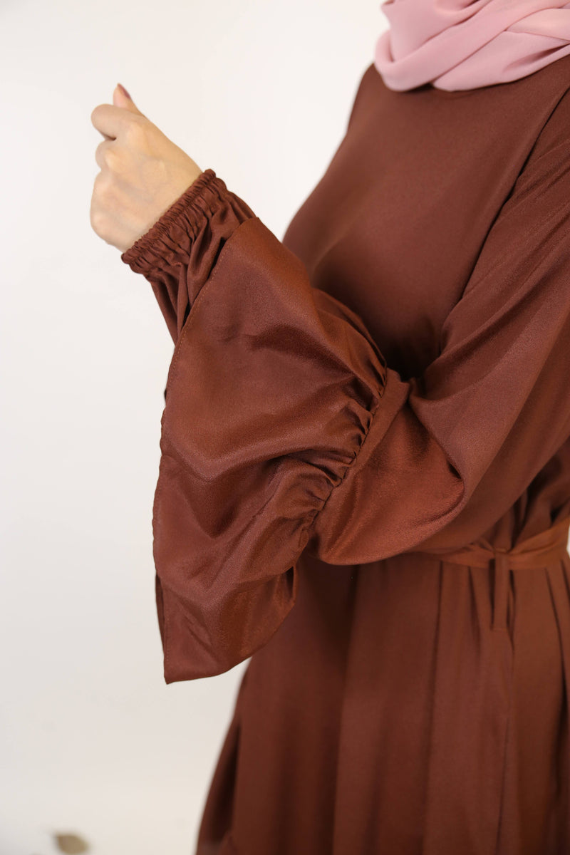 Amber- Glamorous modest maxi dress with slant cut hem and balloon sleeves- Coffee brown
